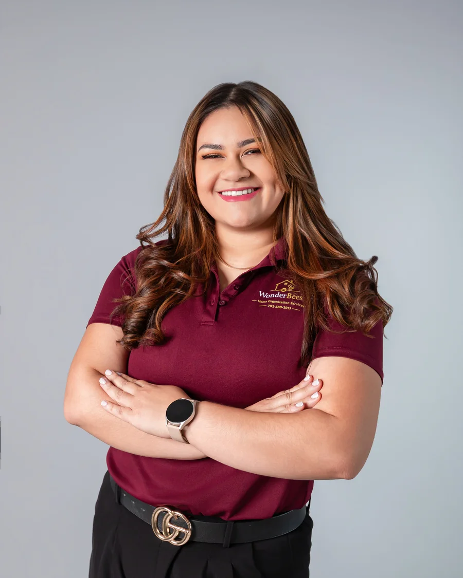 Celeste Sanchez, founder of Wonder Bees Services, in her branded uniform